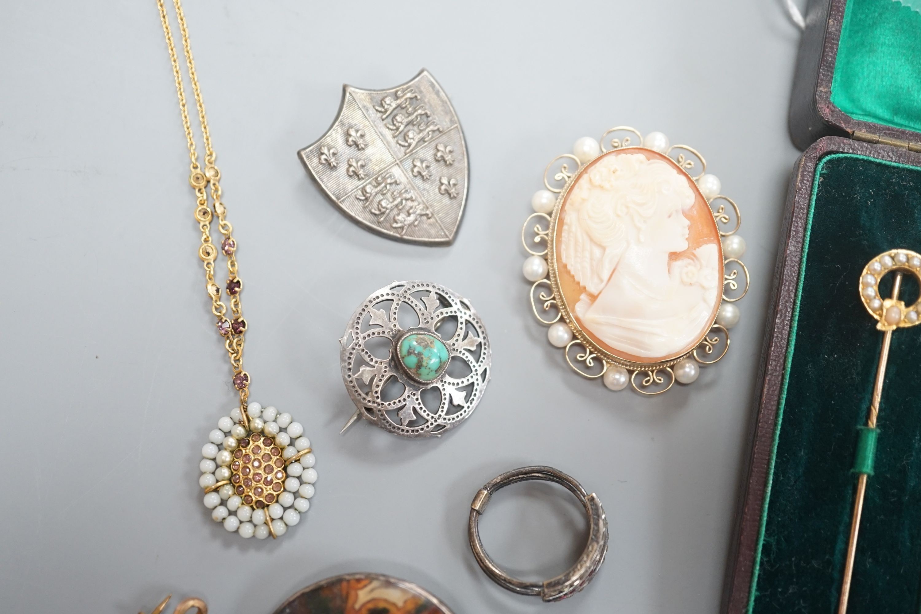 A small group of Victorian and later jewellery, including seed pearl set stick pin, 9ct and gem set bracelet, hardstone brooch, a pair of early 20th century Murrle Bennett & Co, 950 white metal and amethyst set drop earr